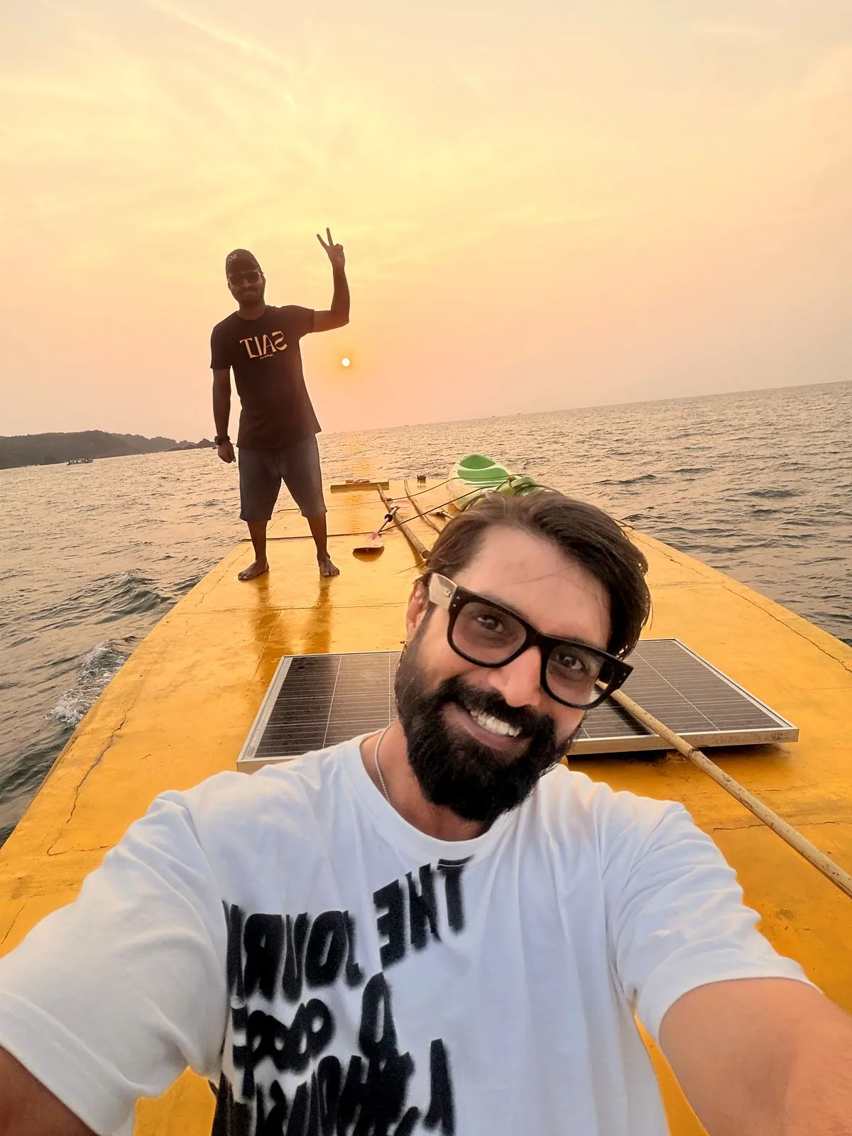 Selfie on the boat deck at golden hour
